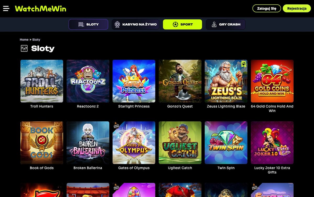 Lobby slotów WatchMeWin na komputerze: menu kategorii i kafelki gier Troll Hunters, Reactoonz 2, Gates of Olympus